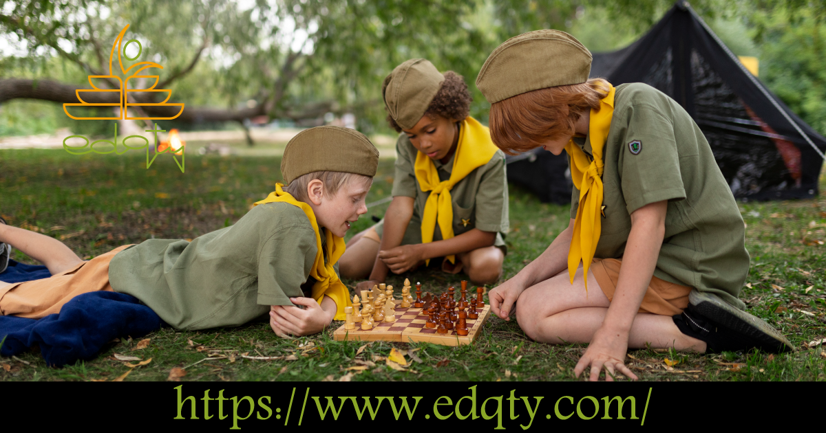 Children playing chess outdoors during a school camp showcasing how adapting to new environments fosters resilience