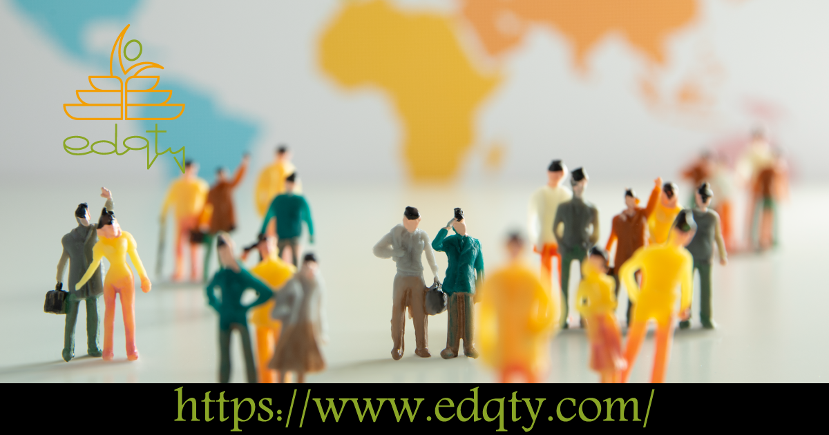 Miniature figures standing in front of a world map symbolizing the global perspective and societal focus of social sciences programs